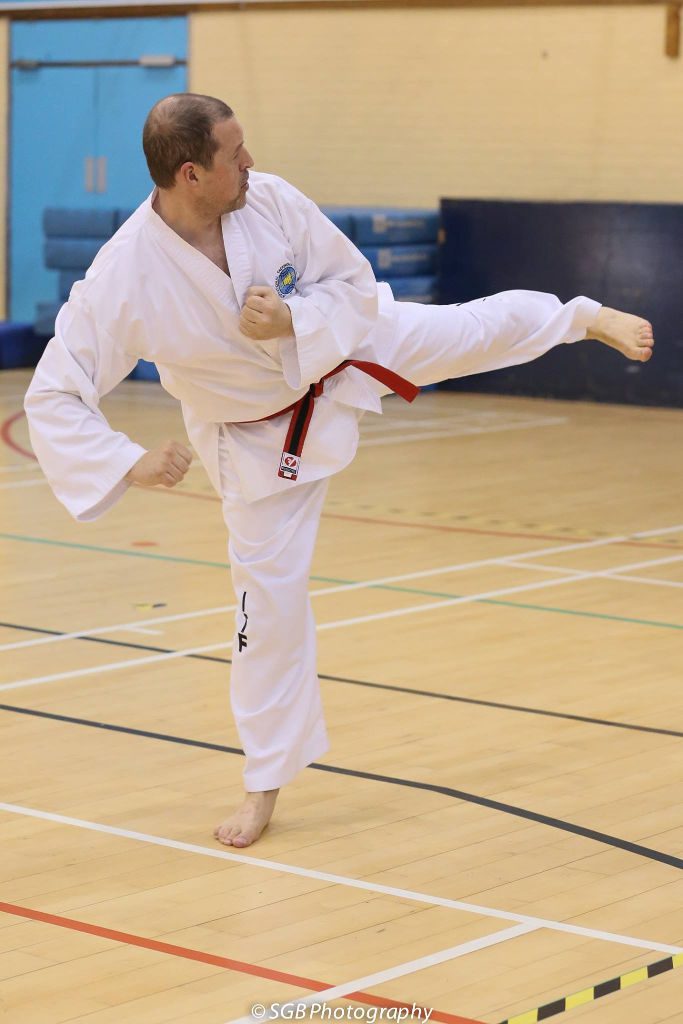 Andy Smith doing a Taekwondo side kick