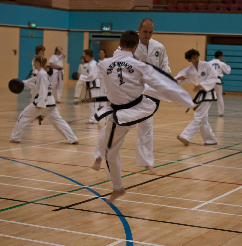 Practicing power kicks at our black belt only Taekwondo classes