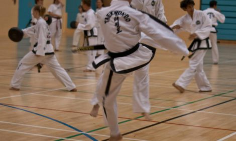 Practicing power kicks at our black belt only Taekwondo classes