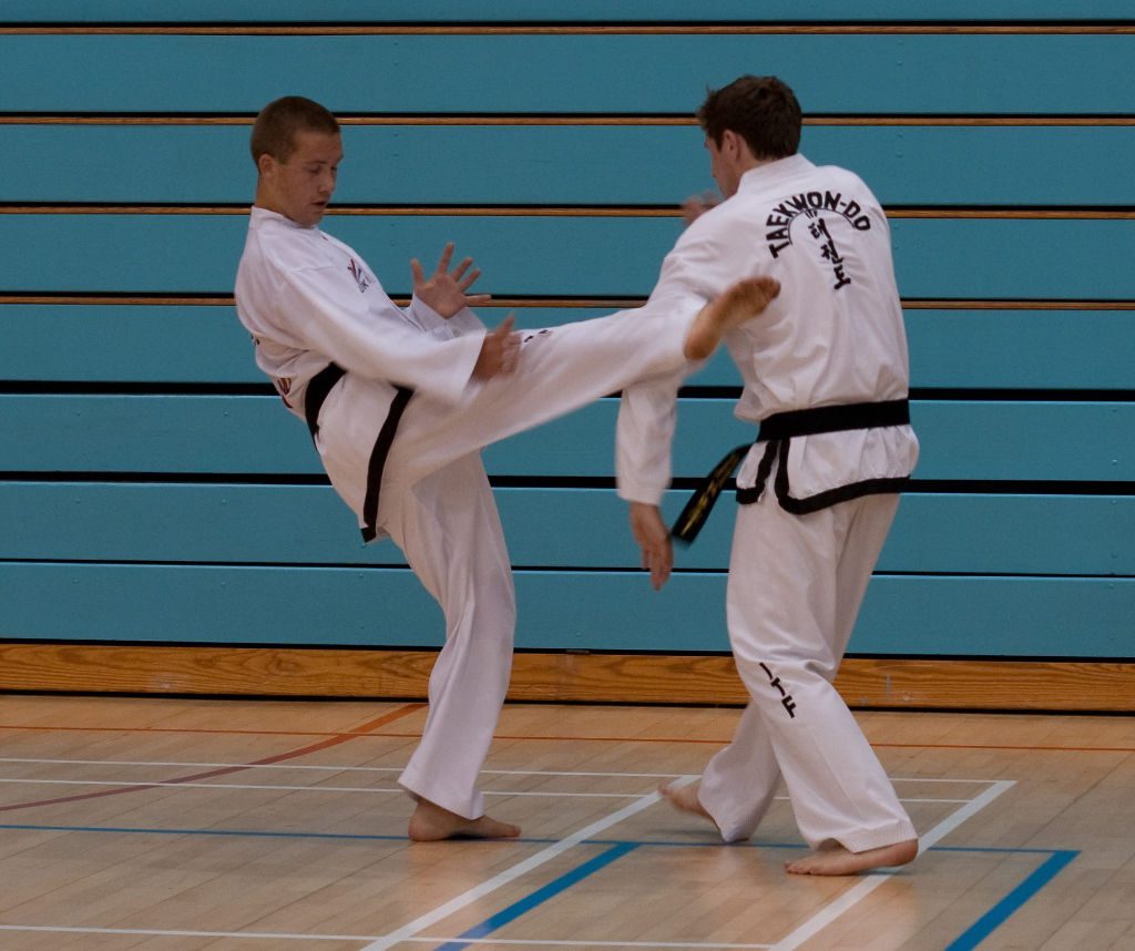 Two black belts sparring