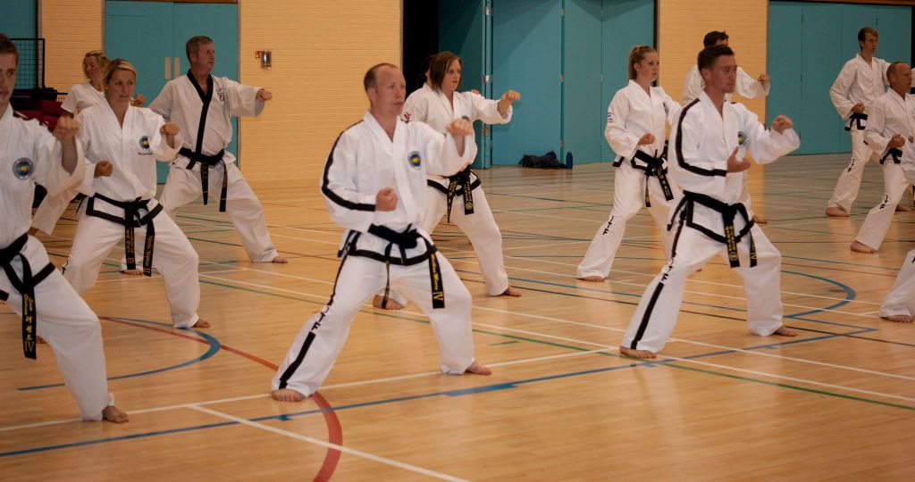 Black belt warmup in preparation for their class