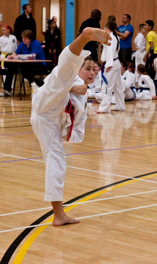 Imogen Allen performing a high section turning kick