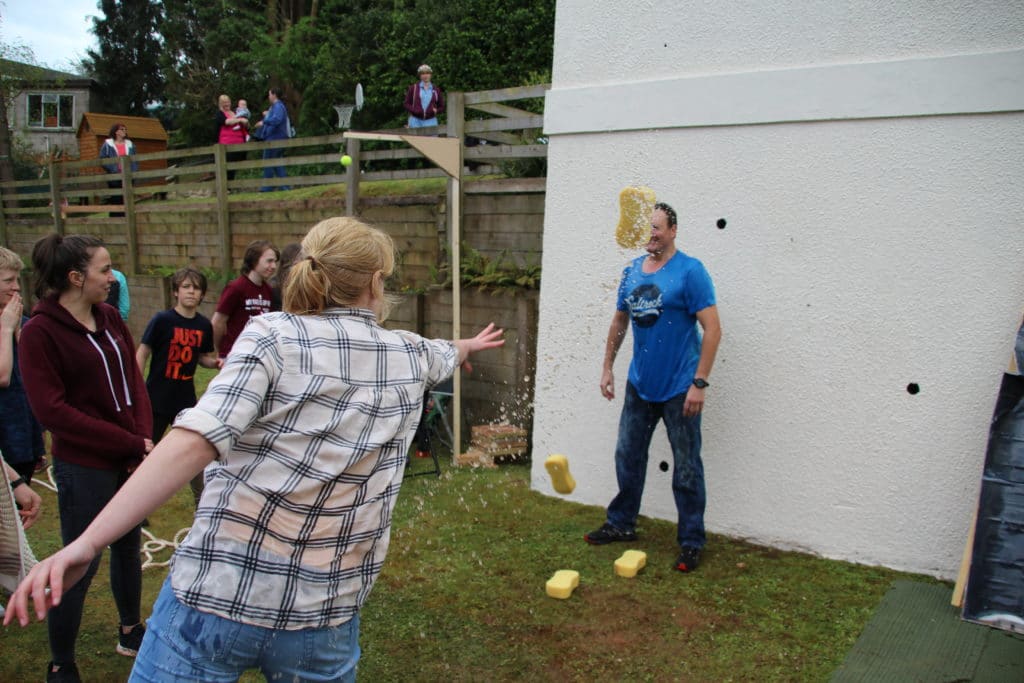 Easter Fundraising Party 2017 Mr Churchward being hit by water sponges