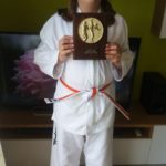 Miss Milly Drinkwater receiving the Grading Award in June 2018 at Torbay Taekwondo Schools.