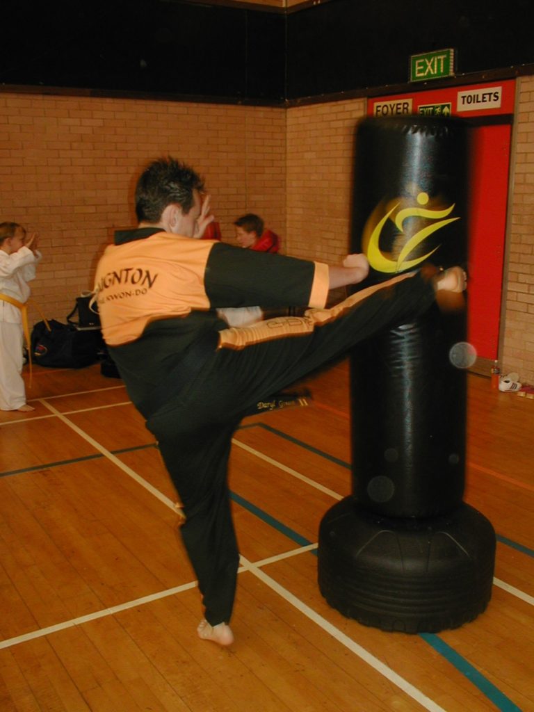 Mr Grant kick training on the wavemaster at Torbay Taekwondo