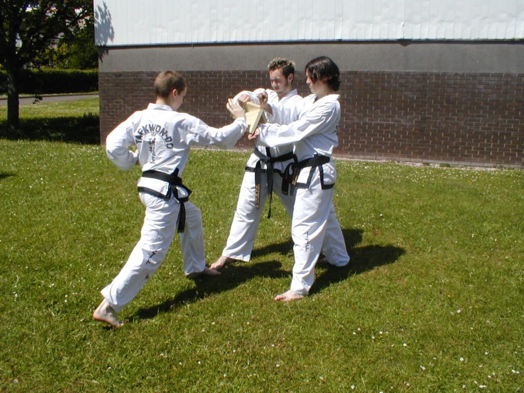 A Torbay Taekwondo student breaking a inch of wood with Palm strike