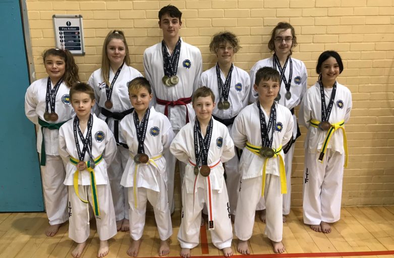 Several members of Torbay Tkd with their medals from the UKITF Spring Championships Feb 2019 in Bath