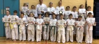 Torbay Taekwondo Students receiving their new belts and certificates Mar 2019