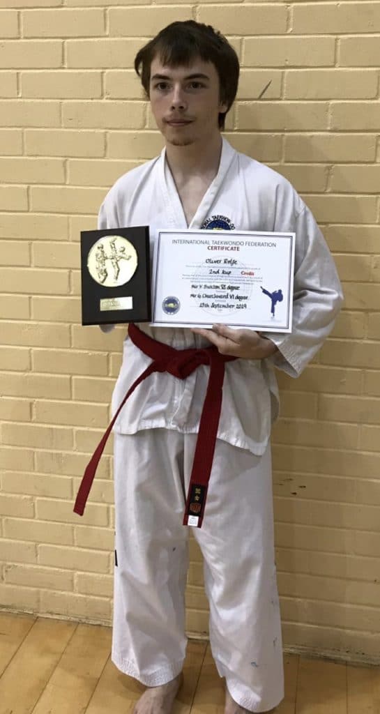 Mr Oliver Rolfe receiving the Grading Award in September 2019 at Torbay Taekwondo Schools