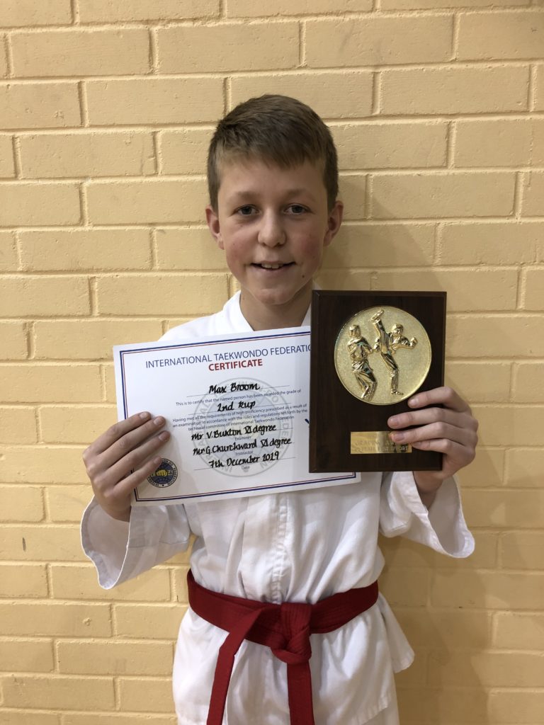 Mr Max Broom receiving the Grading Award in December 2019 at Torbay Taekwondo Schools