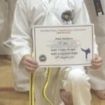 Mr Bohdi Wortmann receiving the Grading Award in Dec 2021 at Torbay Taekwondo Schools