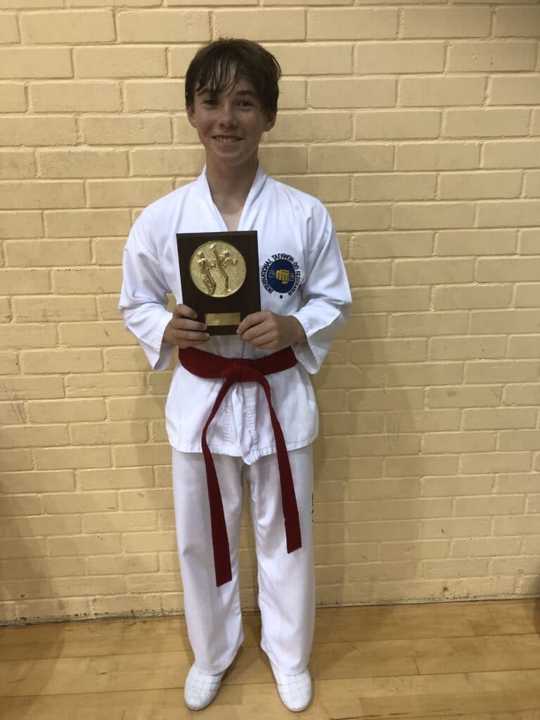 Mr Hudson Cooper-Thompson receiving the Grading Award in June 2021 at Torbay Taekwondo Schools